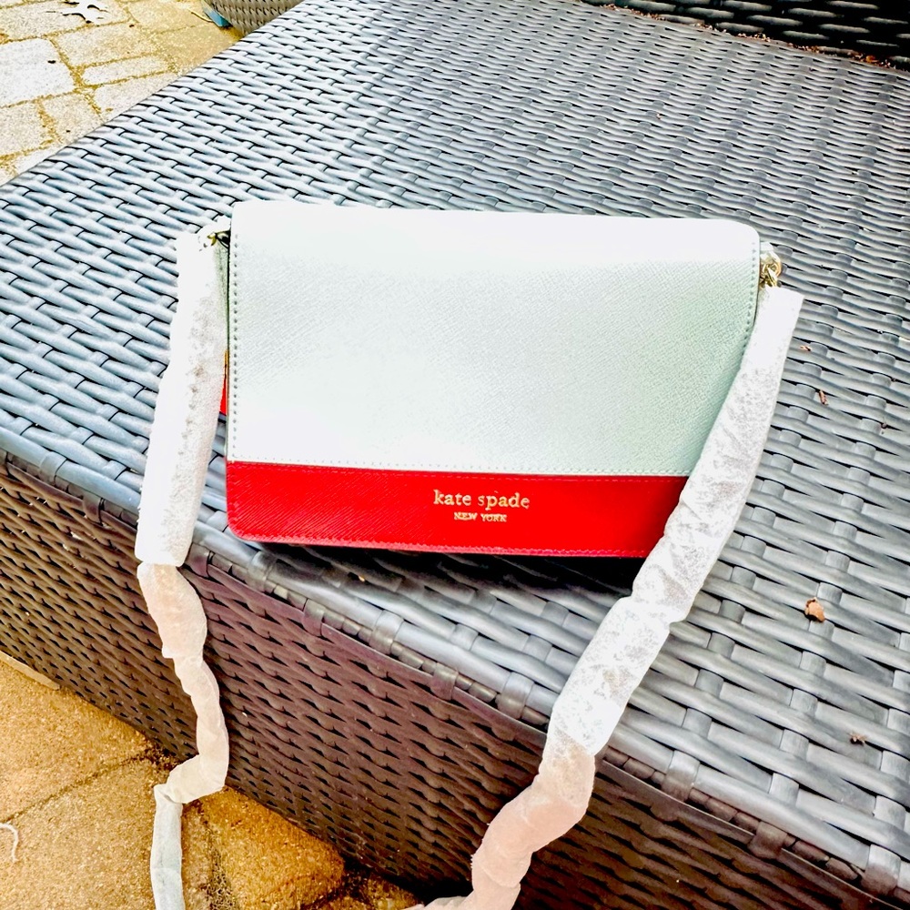 Kate spade small cross body bag light blue with brown brand new!